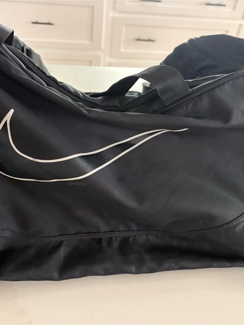 Nike Black Duffel with White Swoosh Accent